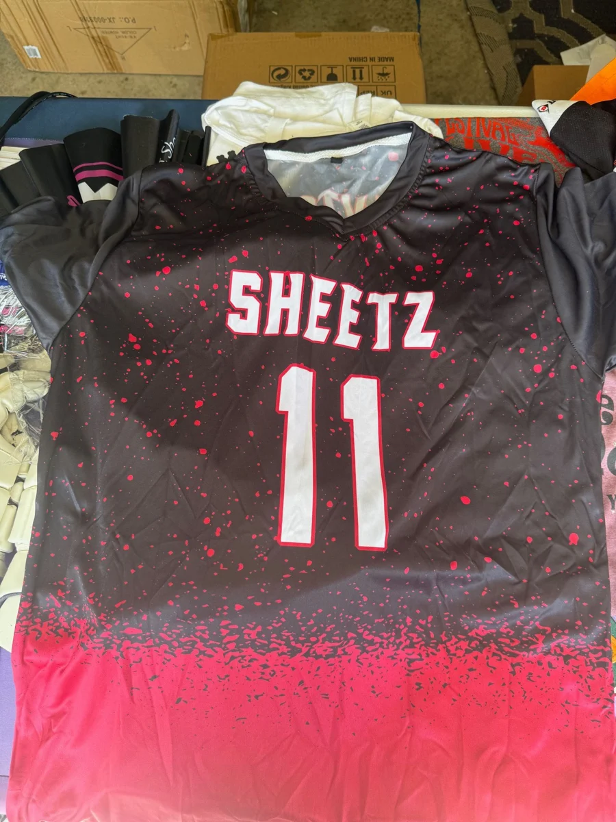 Red and black Sheetz jersey numbered 11