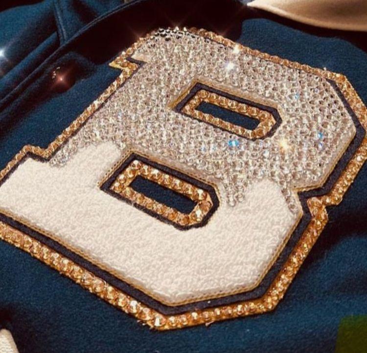 Rhinestone lettering on apparel by GMB